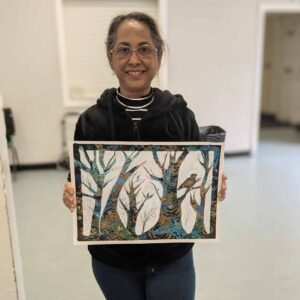 Basingstoke student holding her nature art.