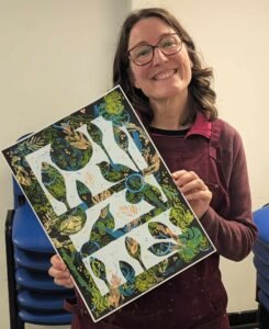 Basingstoke student smiling, showing her finished art