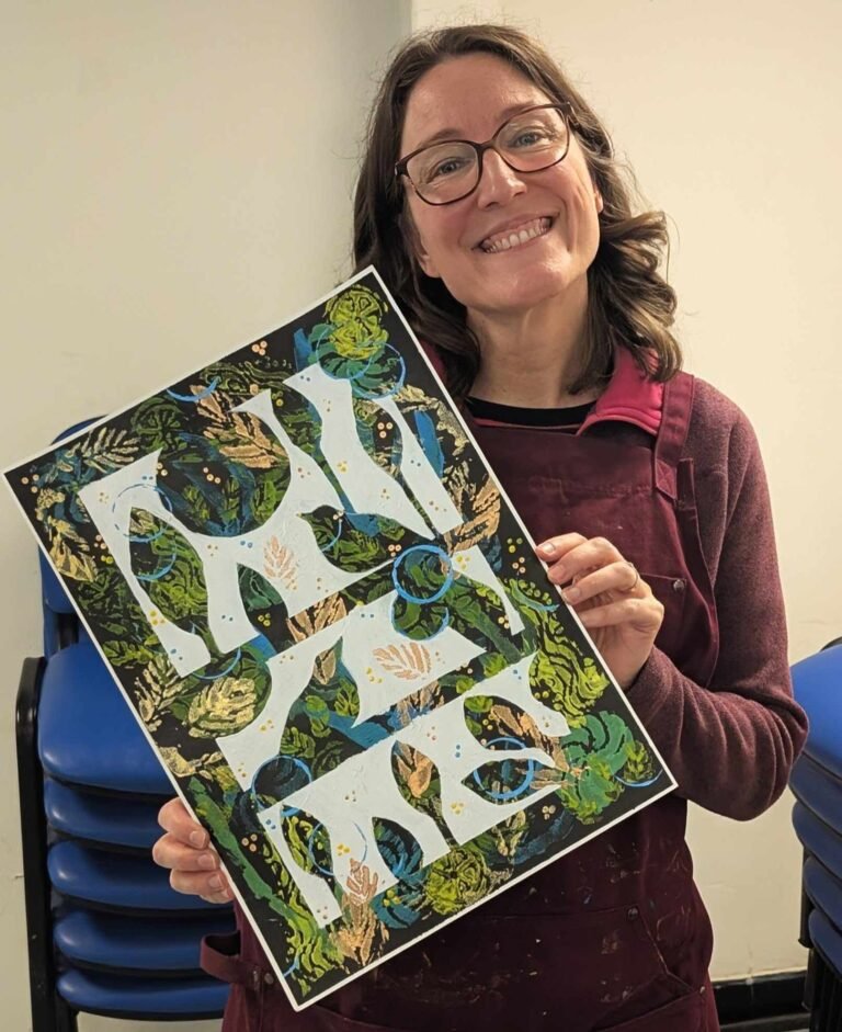 Basingstoke student smiling, showing her finished art